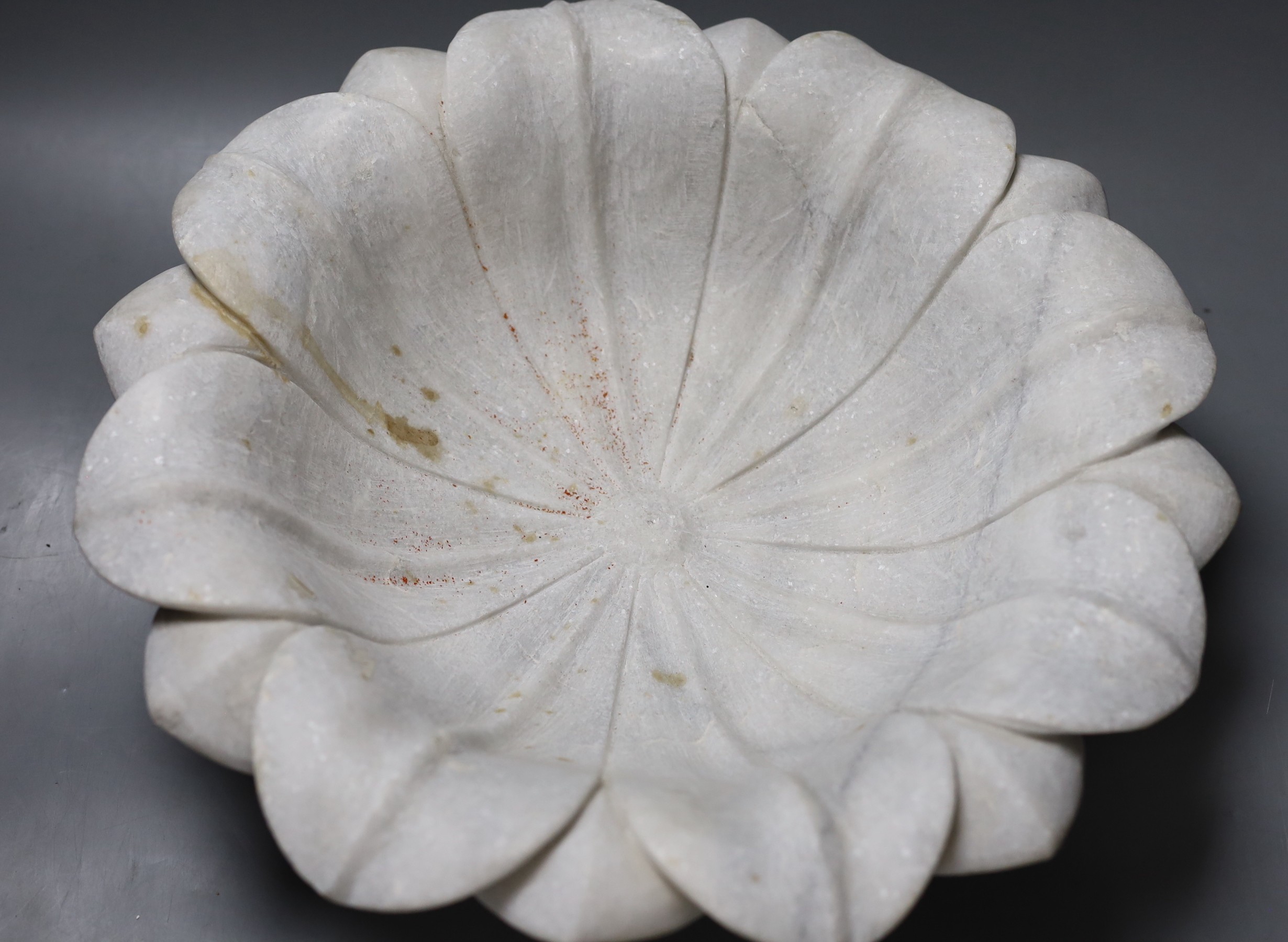 An Indian carved marble lotus flower bowl - 38cm diameter